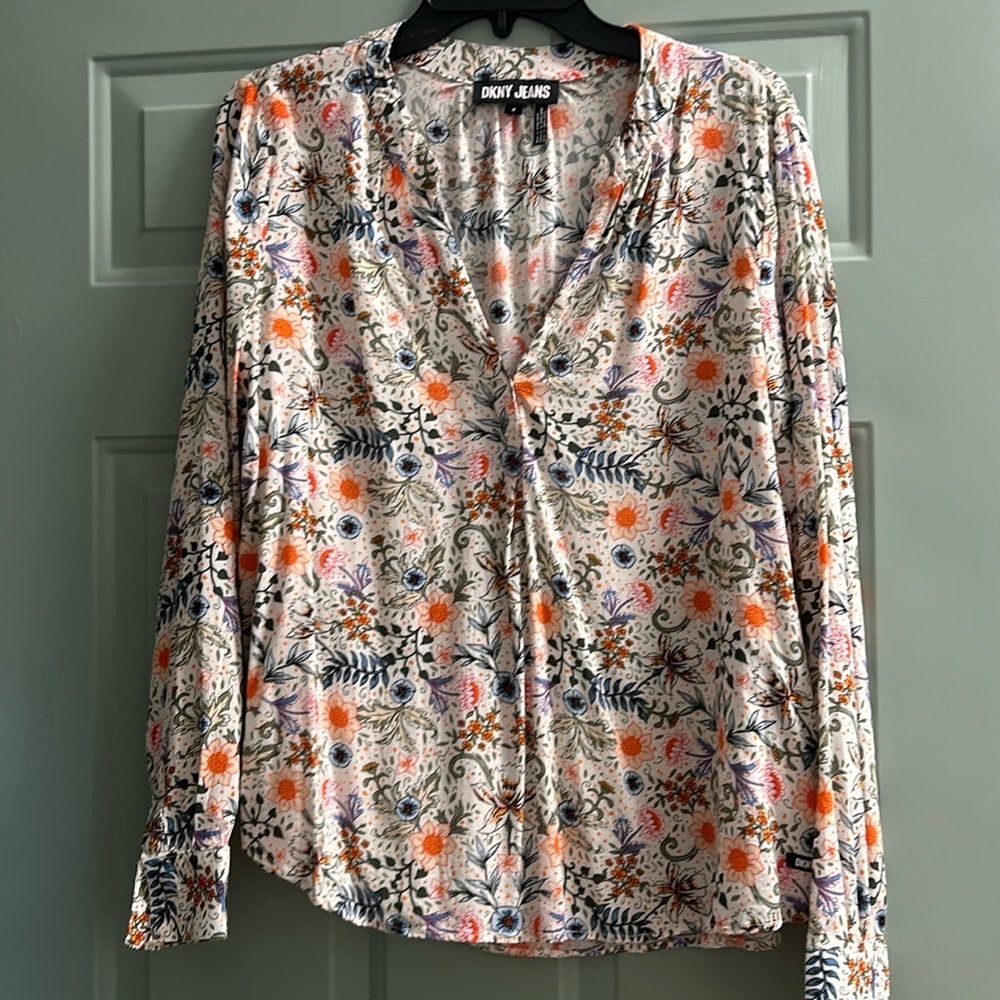 DKNY Jeans long sleeved, 100% rayon blouse.  Single button cuffs